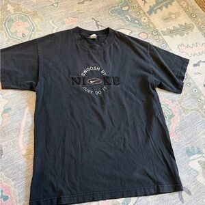 Vintage Nike Black T-Shirt with Red Swoosh Tag